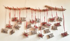 Adventskalender aus Klopapierrollen basteln